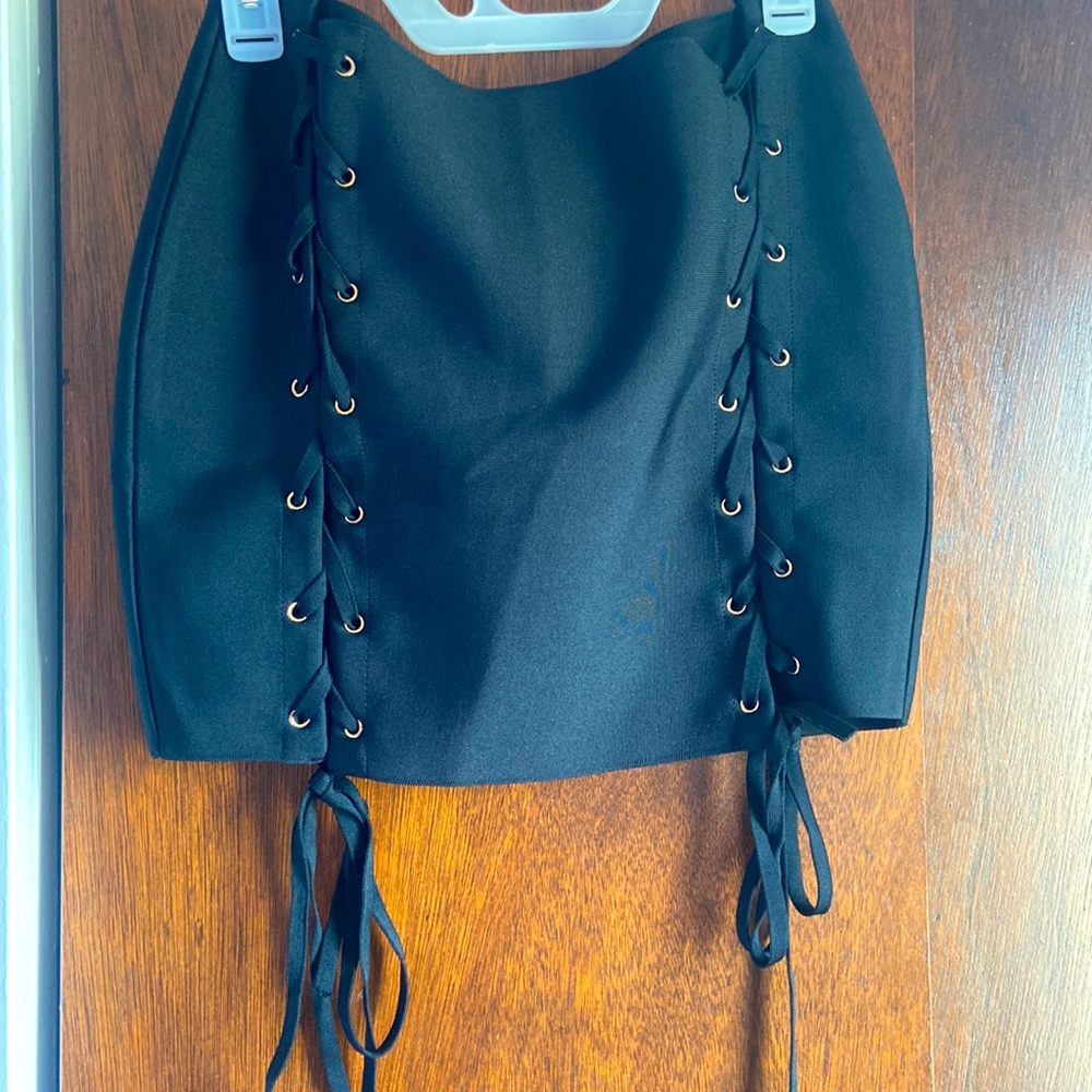 Black lace up mini skirt.